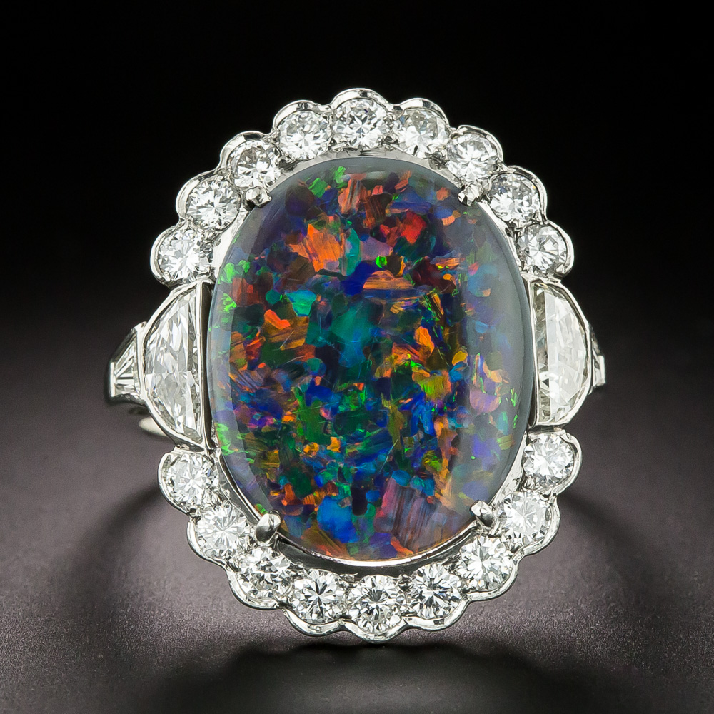 A 9ct gold black opal ring